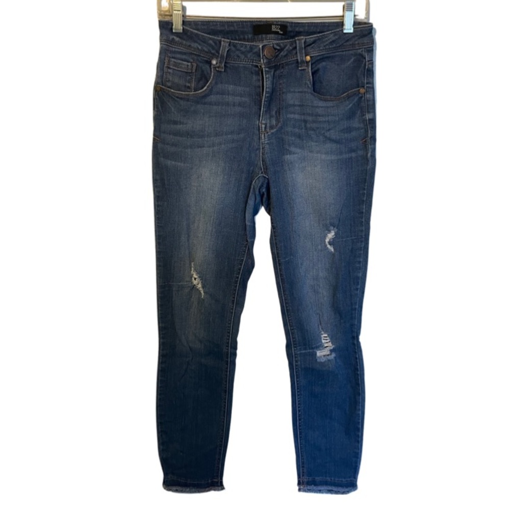 Distressed mid rise dark wash jeans